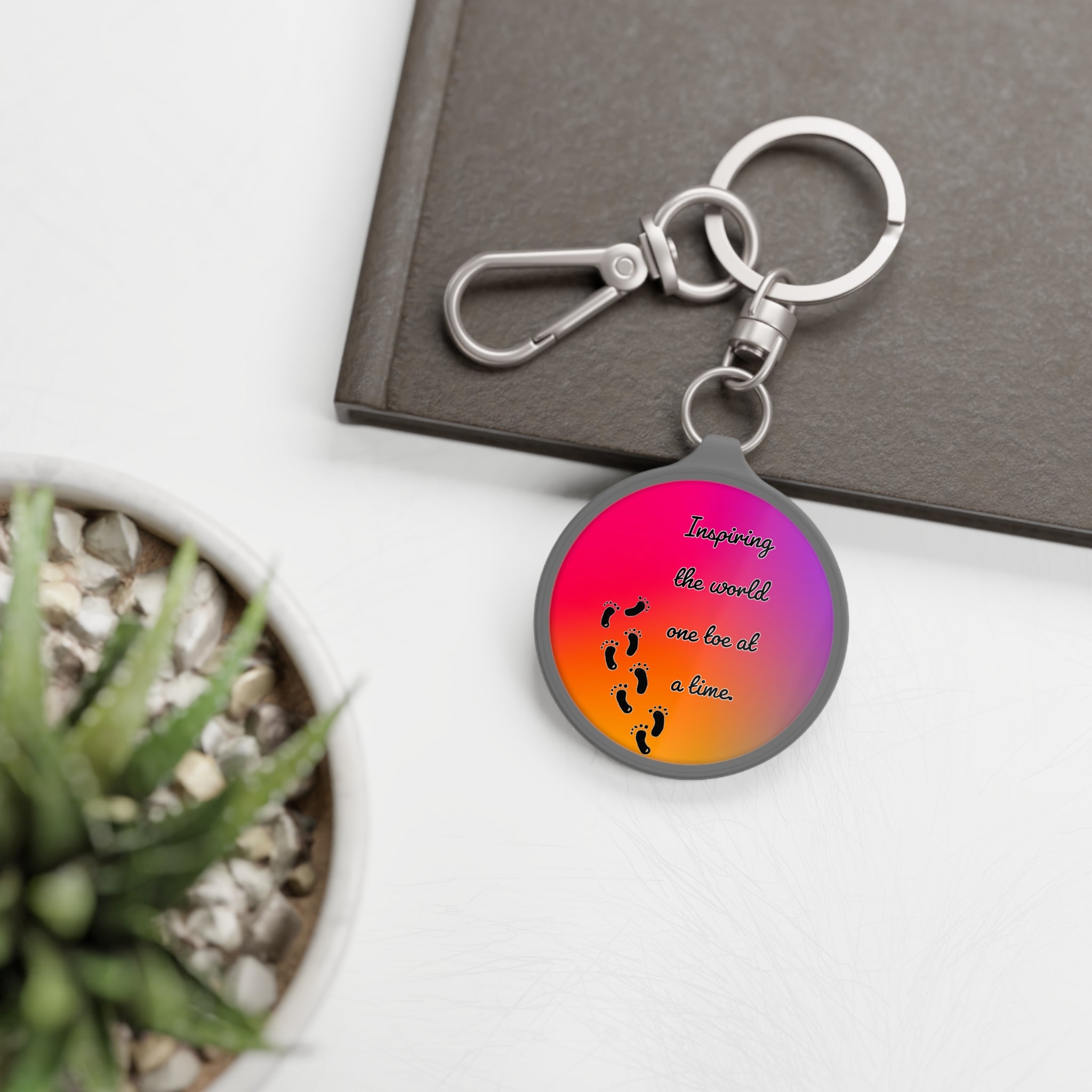 “Inspiring The World, One Toe At A Time.” Keyring Tag | Creative Toes Art Gallery